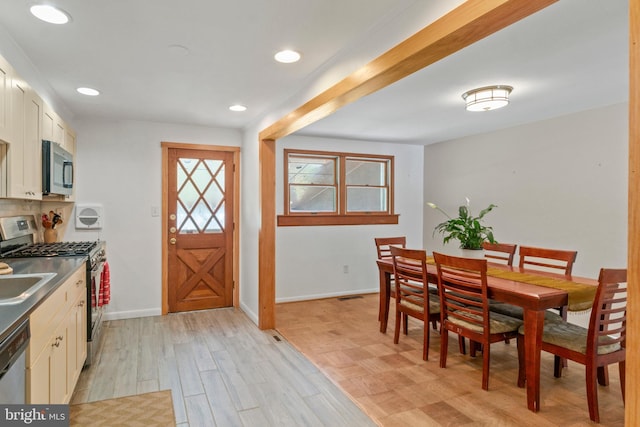 1117 Regina Dr, Baltimore, MD 21227 - dining space with light wood-type flooring and recessed lighting