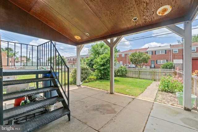 1117 Regina Dr, Baltimore, MD 21227 - fenced backyard with a patio