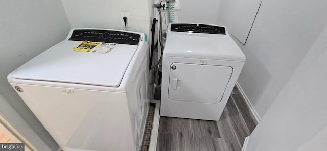 350 Juniper Ct, Herndon, VA 20170 - laundry room with washer and dryer and wood finished floors