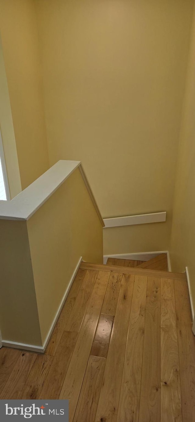 350 Juniper Ct, Herndon, VA 20170 - staircase with wood finished floors and baseboards