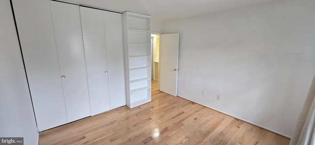 350 Juniper Ct, Herndon, VA 20170 - unfurnished bedroom with light wood finished floors and a closet