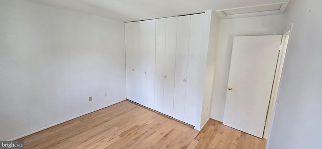350 Juniper Ct, Herndon, VA 20170 - unfurnished bedroom with a closet, wood finished floors, and attic access