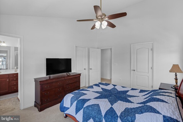 7129 Durrette Rd, Ruther Glen, VA 22546 - bedroom with connected bathroom, ceiling fan, high vaulted ceiling, and light colored carpet