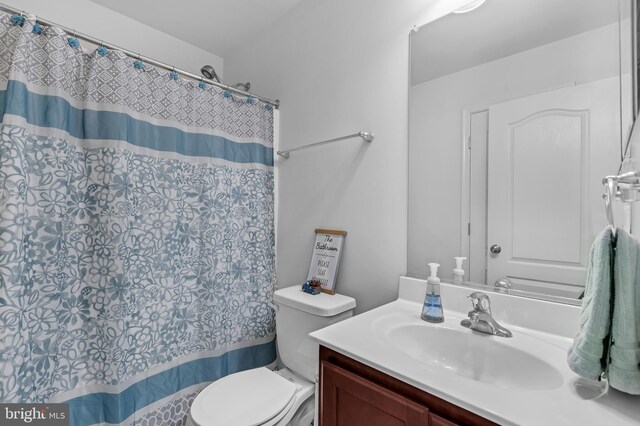 7129 Durrette Rd, Ruther Glen, VA 22546 - full bath with vanity and a shower with curtain