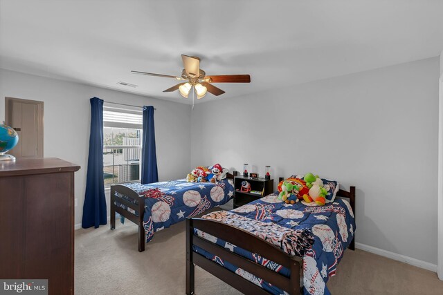 7129 Durrette Rd, Ruther Glen, VA 22546 - bedroom with light colored carpet and ceiling fan