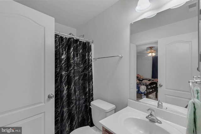 7129 Durrette Rd, Ruther Glen, VA 22546 - full bath with vanity, a shower with shower curtain, and a ceiling fan