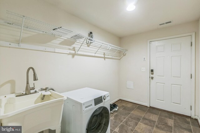 7129 Durrette Rd, Ruther Glen, VA 22546 - washroom with washer / clothes dryer and baseboards