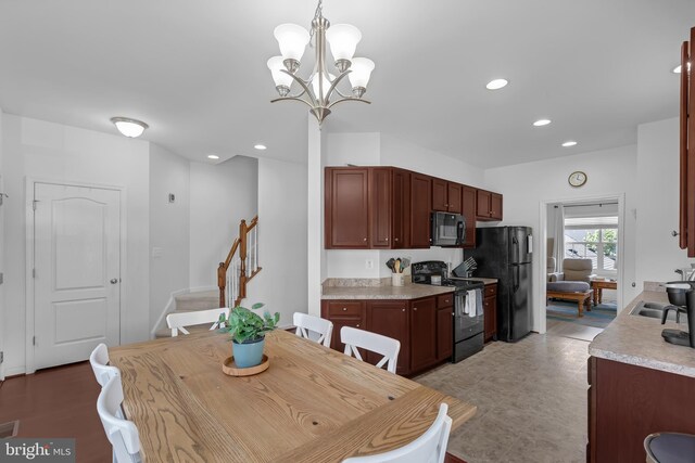 7129 Durrette Rd, Ruther Glen, VA 22546 - dining space with stairs, recessed lighting, and a chandelier