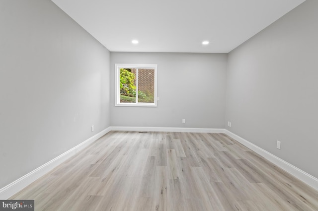 2 Stonehenge Cir Unit 2A-2, Baltimore, MD 21208 - unfurnished room featuring light wood-style flooring and recessed lighting