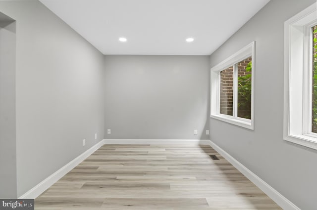 2 Stonehenge Cir Unit 2A-2, Baltimore, MD 21208 - unfurnished room featuring light wood finished floors and recessed lighting