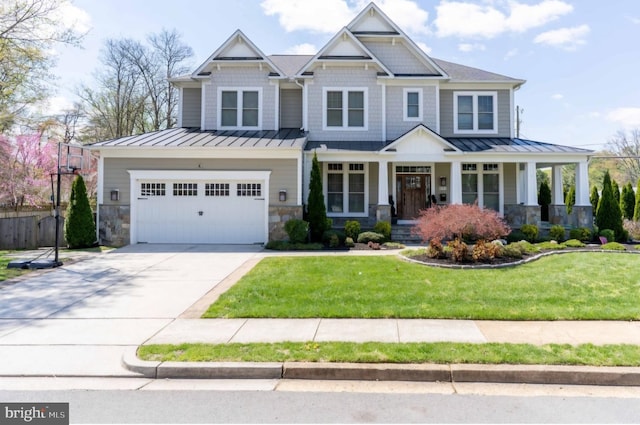 801 Meadow Ln SW, Vienna, VA 22180 - craftsman house with a standing seam roof, driveway, an attached garage, stone siding, and a metal roof
