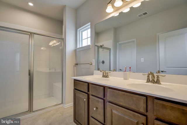 6647 Ballenger Run Blvd, Frederick, MD 21703 - full bathroom with a shower stall, double vanity, and tile patterned flooring