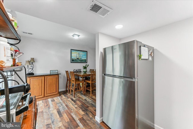 15 Willow Ct, Elkton, MD 21921 - kitchen featuring freestanding refrigerator, light wood finished floors, brown cabinets, range, and recessed lighting