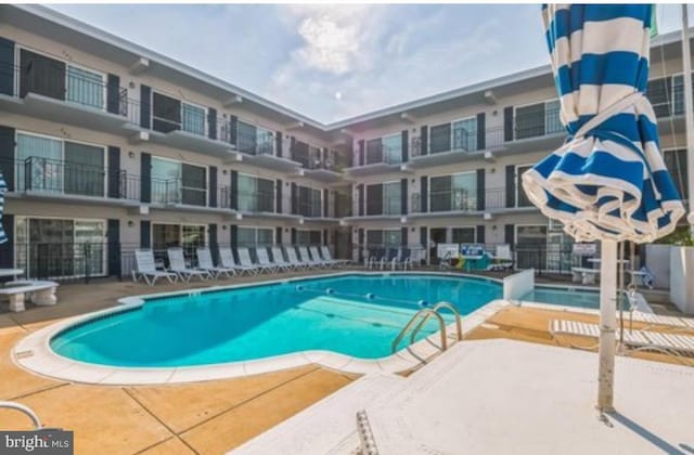405 Ocean Ave Unit 110, Wildwood, NJ 08260 - community pool with a patio area