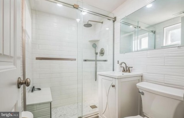 405 Ocean Ave Unit 110, Wildwood, NJ 08260 - full bath with vanity, a shower stall, and tile walls