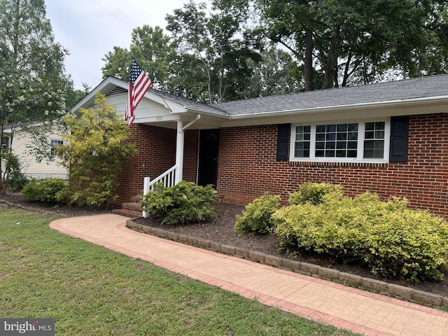 5379 Payne Dr, King George, VA 22485 - ranch-style house featuring brick siding and a front lawn