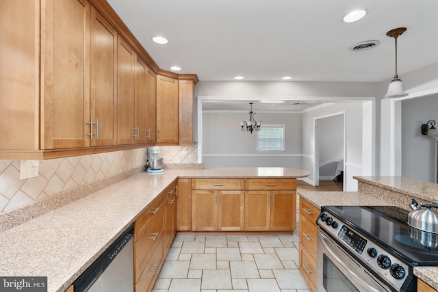 5379 Payne Dr, King George, VA 22485 - kitchen with stainless steel appliances, hanging light fixtures, a chandelier, recessed lighting, and decorative backsplash