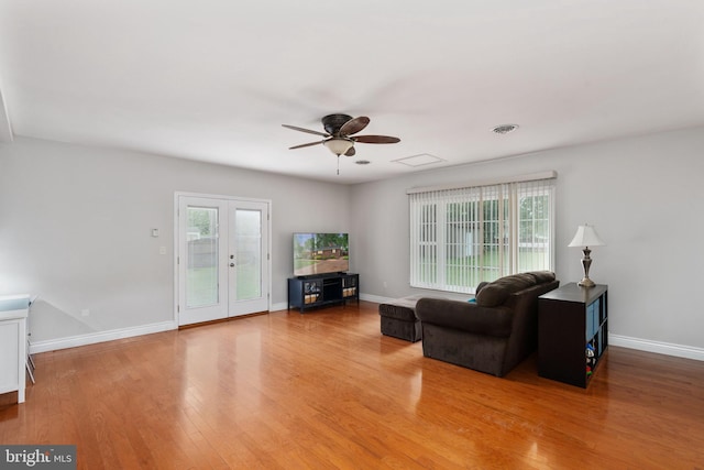 5379 Payne Dr, King George, VA 22485 - living room with wood finished floors, ceiling fan, and french doors