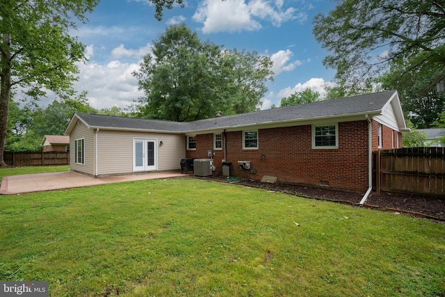 5379 Payne Dr, King George, VA 22485 - back of house with a patio area, brick siding, french doors, and crawl space