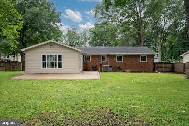 5379 Payne Dr, King George, VA 22485 - rear view of property with a patio, a fenced backyard, crawl space, and brick siding