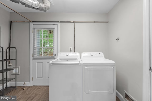 31 Mercator Ln, Willingboro, NJ 08046 - washroom with washer and dryer and wood finished floors