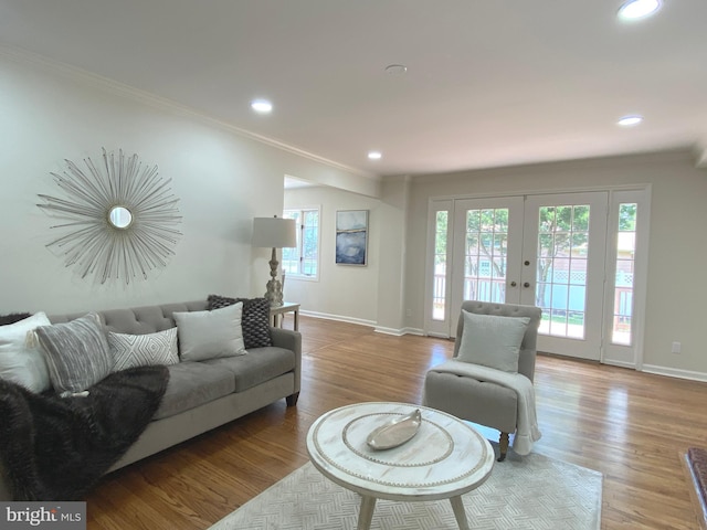 3103 Woodhaven Dr, Cinnaminson, NJ 08077 - living area with french doors, crown molding, wood finished floors, and recessed lighting