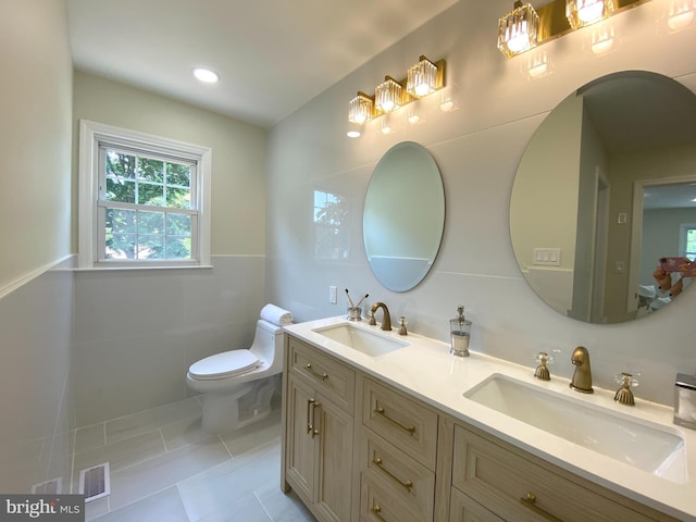 3103 Woodhaven Dr, Cinnaminson, NJ 08077 - bathroom featuring plenty of natural light, double vanity, and tile patterned flooring