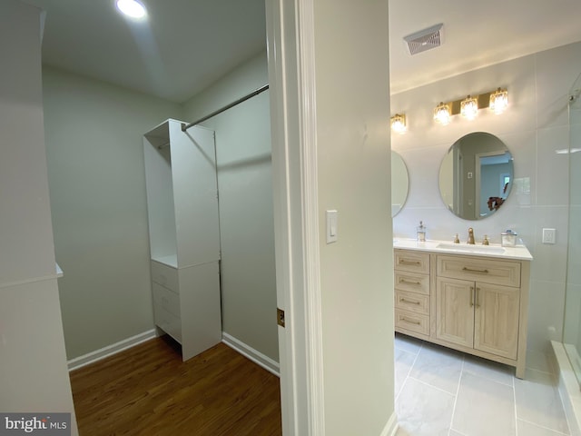 3103 Woodhaven Dr, Cinnaminson, NJ 08077 - full bath featuring vanity, a shower, and wood finished floors