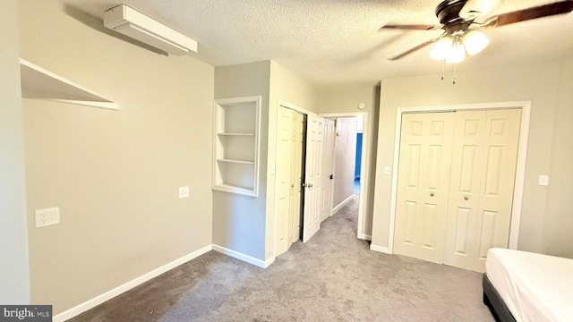 421 N Hanover St, Carlisle, PA 17013 - carpeted bedroom with a textured ceiling and a ceiling fan