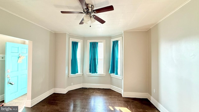 421 N Hanover St, Carlisle, PA 17013 - unfurnished room featuring dark wood-style floors, ornamental molding, and a ceiling fan