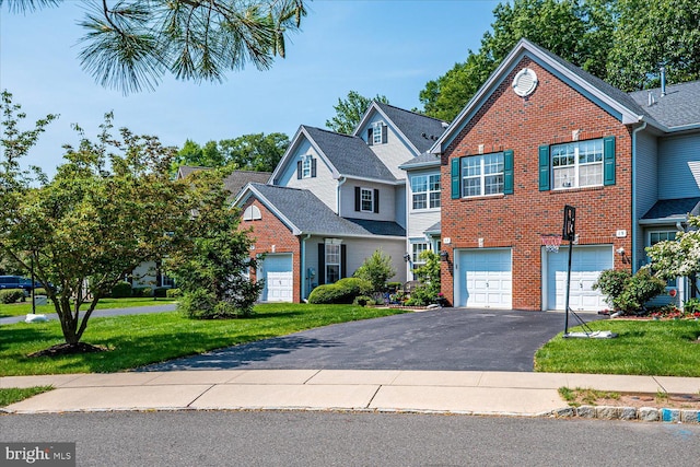 17 Ludlow Ct, Princeton Junction, NJ 08550 - view of front of house featuring brick siding, asphalt driveway, a garage, and a front yard