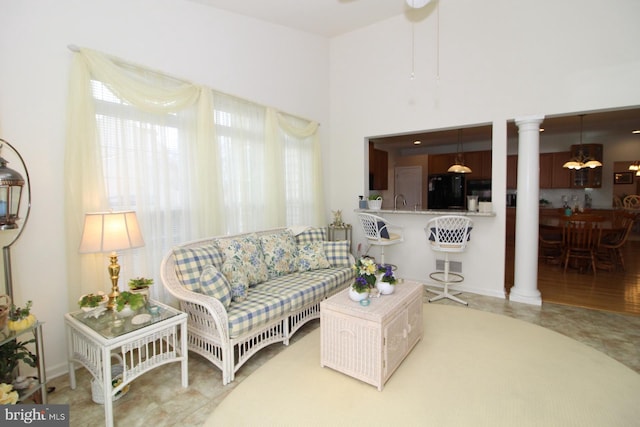 802 Chesapeake Ct, Newark, DE 19702 - living area featuring ornate columns, a chandelier, and ceiling fan