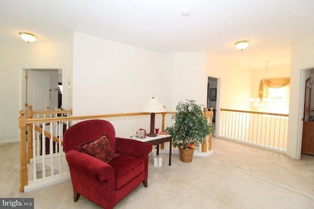 802 Chesapeake Ct, Newark, DE 19702 - sitting room with carpet and an upstairs landing