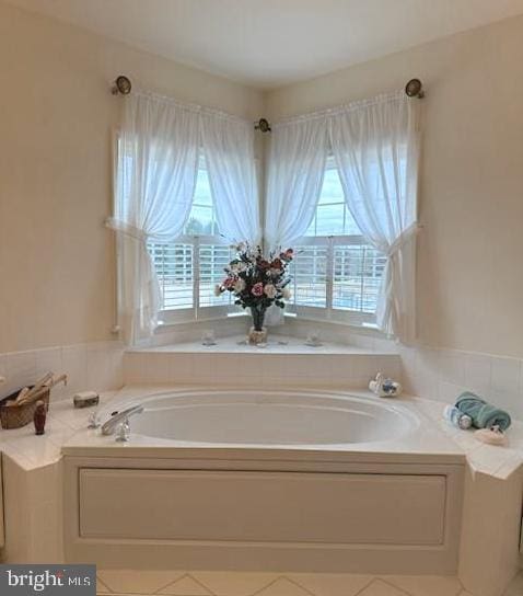 802 Chesapeake Ct, Newark, DE 19702 - full bath with a garden tub and tile patterned flooring