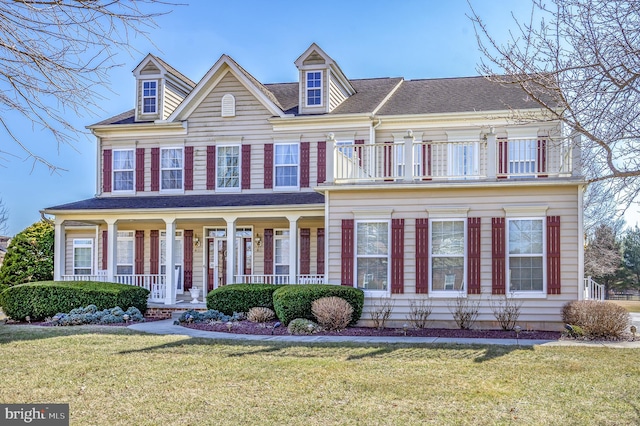 802 Chesapeake Ct, Newark, DE 19702 - view of front of property featuring a balcony, a front yard, and a porch