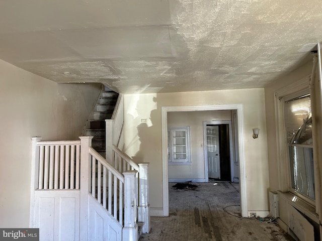 210 Highland Ave, Trenton, NJ 08618 - staircase featuring baseboards