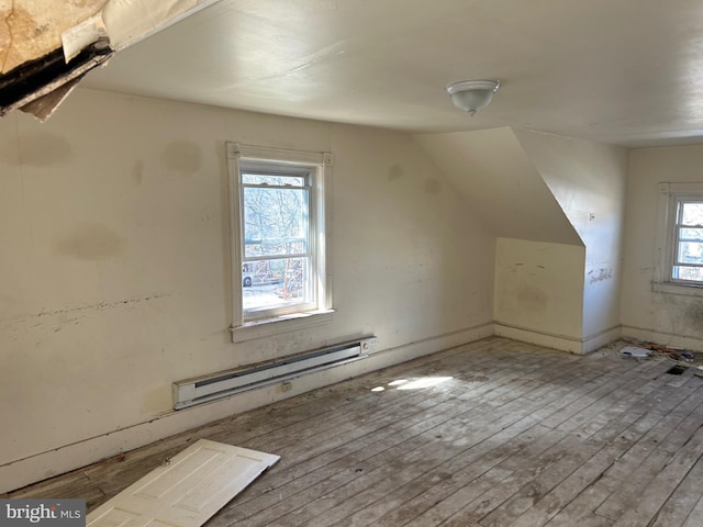210 Highland Ave, Trenton, NJ 08618 - additional living space with a baseboard radiator, vaulted ceiling, and wood-type flooring