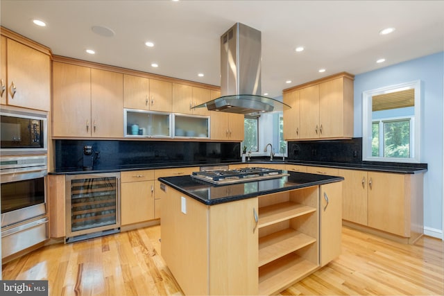 11 Forest Rdg, Newark, DE 19711 - kitchen with island exhaust hood, stainless steel appliances, wine cooler, light brown cabinetry, and a warming drawer