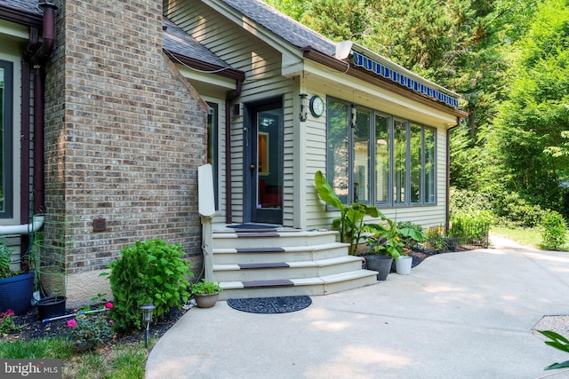 11 Forest Rdg, Newark, DE 19711 - property entrance with a patio and a shingled roof