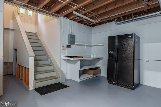 11 Forest Rdg, Newark, DE 19711 - below grade area featuring black refrigerator with ice dispenser, stairway, and electric panel