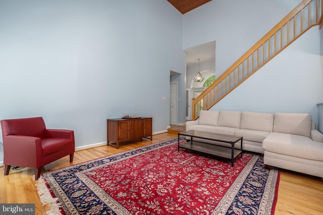 11 Forest Rdg, Newark, DE 19711 - living area featuring high vaulted ceiling, wood finished floors, and stairs