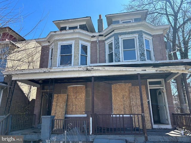 212 Highland Ave, Trenton, NJ 08618 - view of front of property with covered porch and brick siding