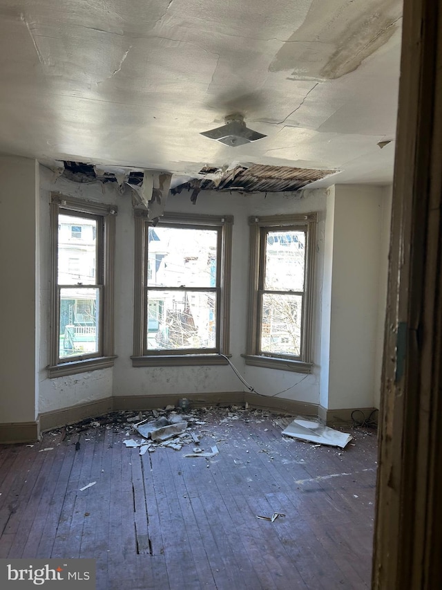212 Highland Ave, Trenton, NJ 08618 - unfurnished room with hardwood / wood-style flooring and plenty of natural light