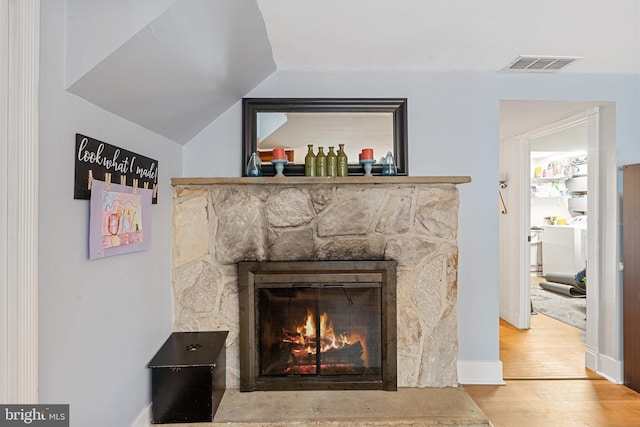 202 E Franklin Ave, Edgewater Park, NJ 08010 - detailed view of a stone fireplace and wood finished floors