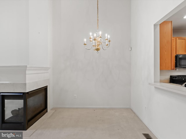 2135 Vittoria Ct Unit 33, Bowie, MD 20721 - unfurnished living room with a chandelier, a premium fireplace, and light colored carpet