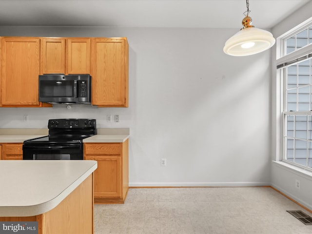 2135 Vittoria Ct Unit 33, Bowie, MD 20721 - kitchen featuring black appliances, light countertops, and hanging light fixtures