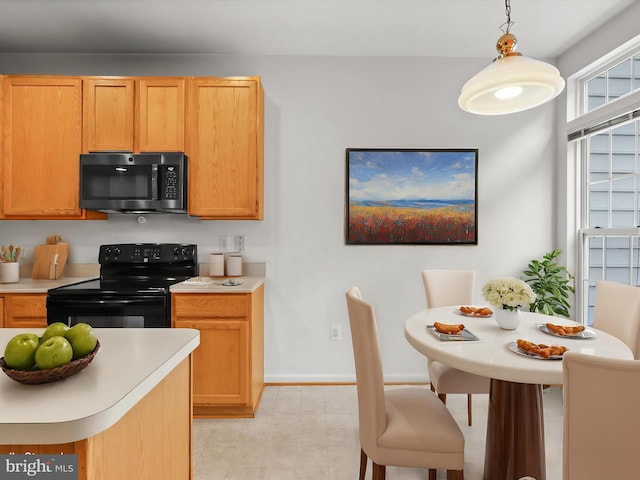 2135 Vittoria Ct Unit 33, Bowie, MD 20721 - kitchen featuring black appliances, light countertops, and hanging light fixtures