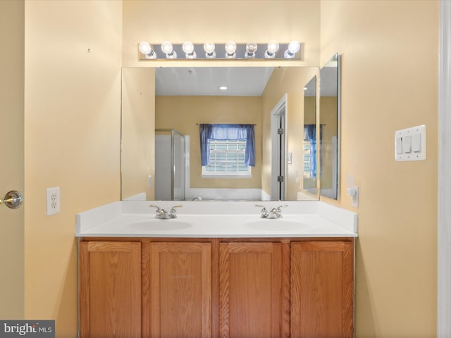 2135 Vittoria Ct Unit 33, Bowie, MD 20721 - bathroom featuring double vanity and a shower with door