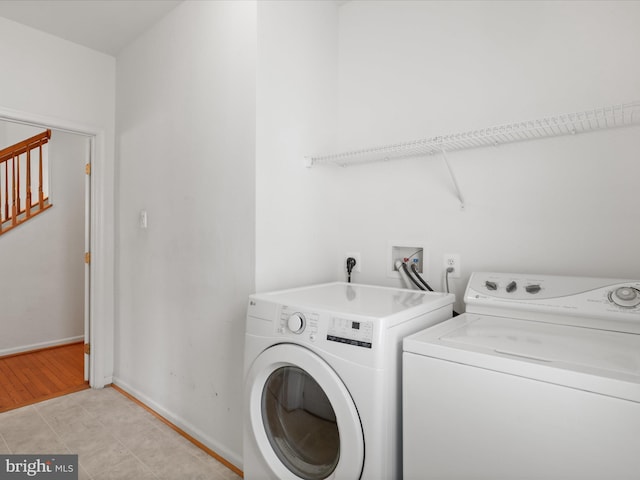 2135 Vittoria Ct Unit 33, Bowie, MD 20721 - laundry area featuring washer and clothes dryer and baseboards