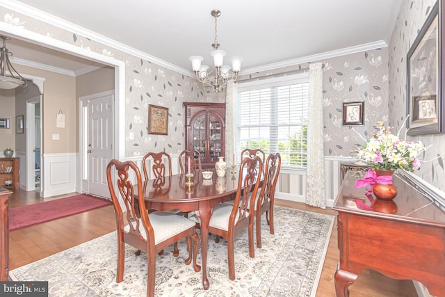 1 Chase Cir, Barto, PA 19504 - dining space with wallpapered walls, wood finished floors, a chandelier, a wainscoted wall, and crown molding
